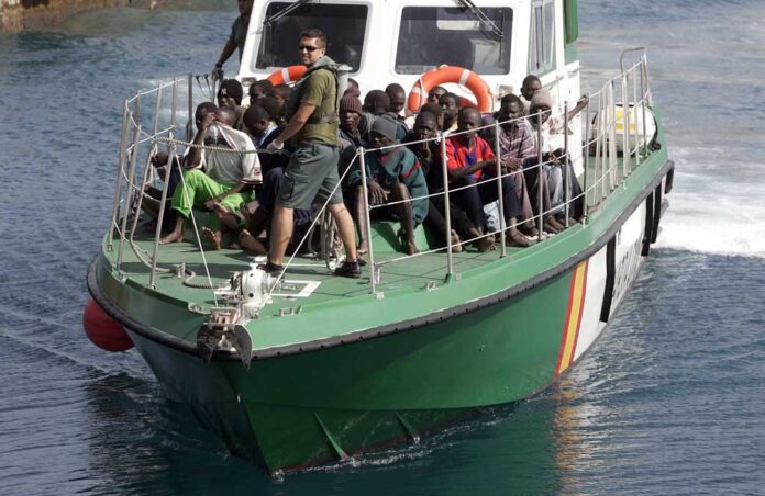 A Spanish Civil Guard vessel carries illegal immigrants to shore in Fuerteventura